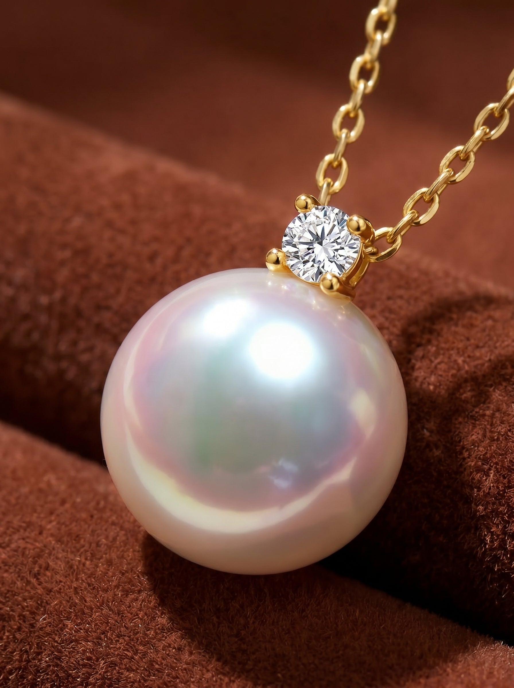 Lumiere - Akoya Pearl Drop Necklace with a single 8.5mm round pearl and a small diamond accent on a delicate gold chain. @pearl