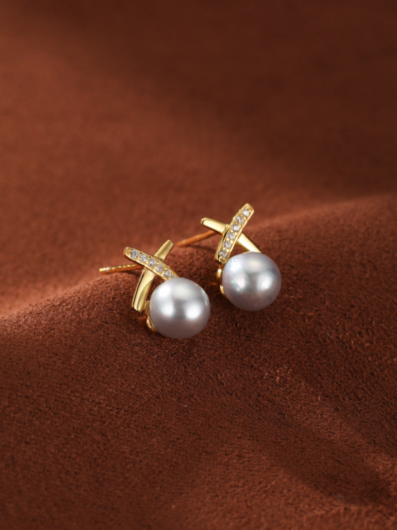 Veritas Akoya Pearl Cross Stud Earrings with gold-toned metal and sparkling crystals, featuring lustrous pearls.