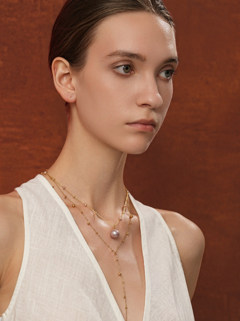 Glowdrop - Collier flottant superposé, perles d'eau douce