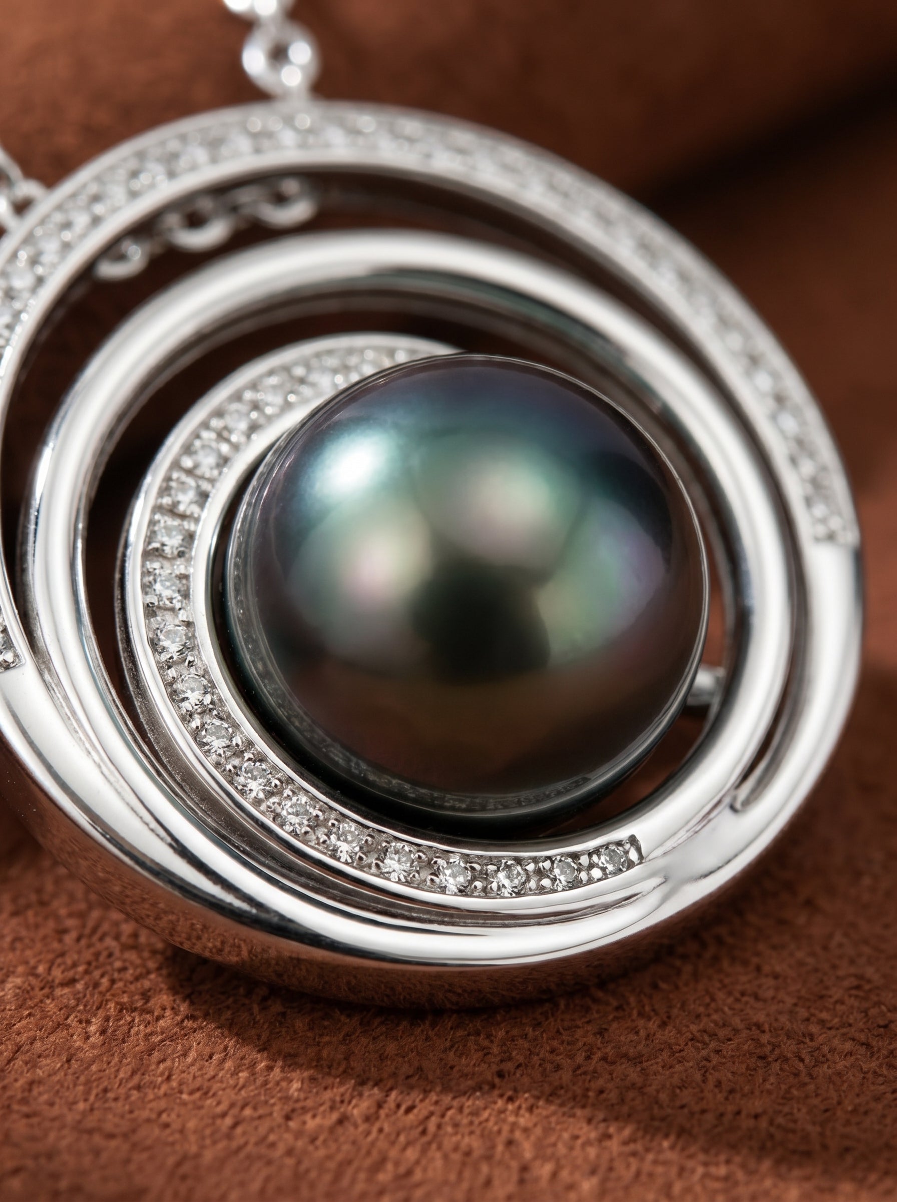 Aether Tahitian Pearl Concentric Large Drop Necklace featuring a large, iridescent black pearl surrounded by a double halo of sparkling diamonds.@pearl