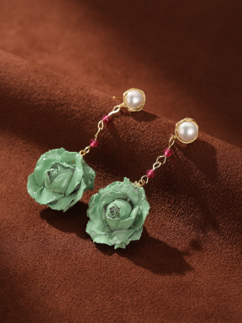 Awaken Freshwater Pearl Flower Dangle Earrings feature white pearl studs, gold-toned chains with pink beads, and mint green rose flower pendants. @pearl