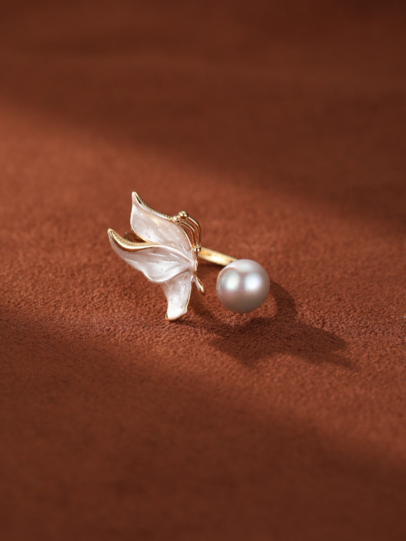 Chrysalis Freshwater Pearl Butterfly Cuff Ring featuring a delicate white butterfly wing design with gold accents and a lustrous 8.5mm white button freshwater pearl.