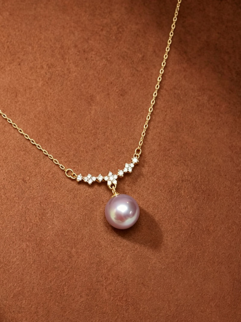 Eclat - Eclat Freshwater Pearl Star Cluster Drop Necklace with a single purple freshwater pearl and a star cluster accent on a delicate gold chain. @perle