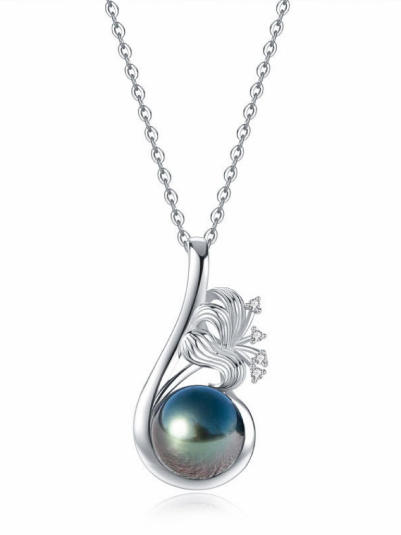 Enfold Swirl necklace featuring a 10mm round Tahitian pearl in a silver pendant with a flower design and accent stones. @pearl
