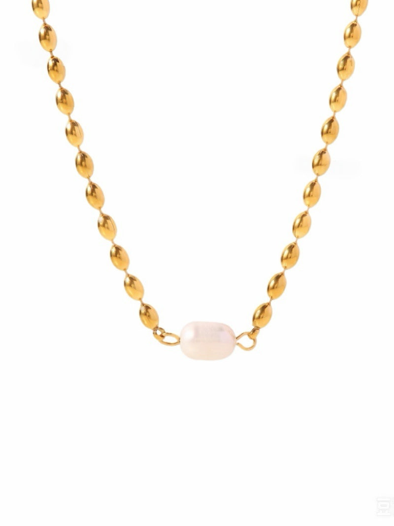 Gold-tone layered chain necklace with a single oval white freshwater pearl centerpiece