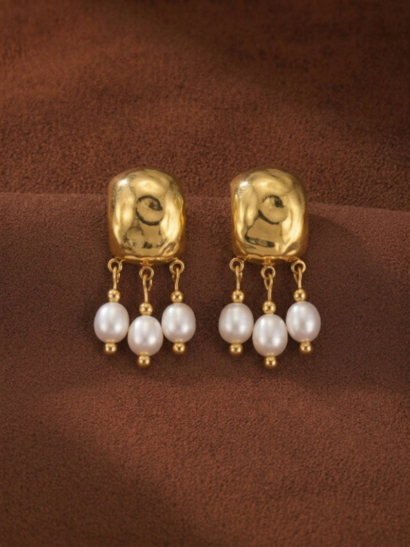 Harvest - Freshwater Pearl Drop Earrings featuring hammered gold tops and three dangling white freshwater seed pearls each.