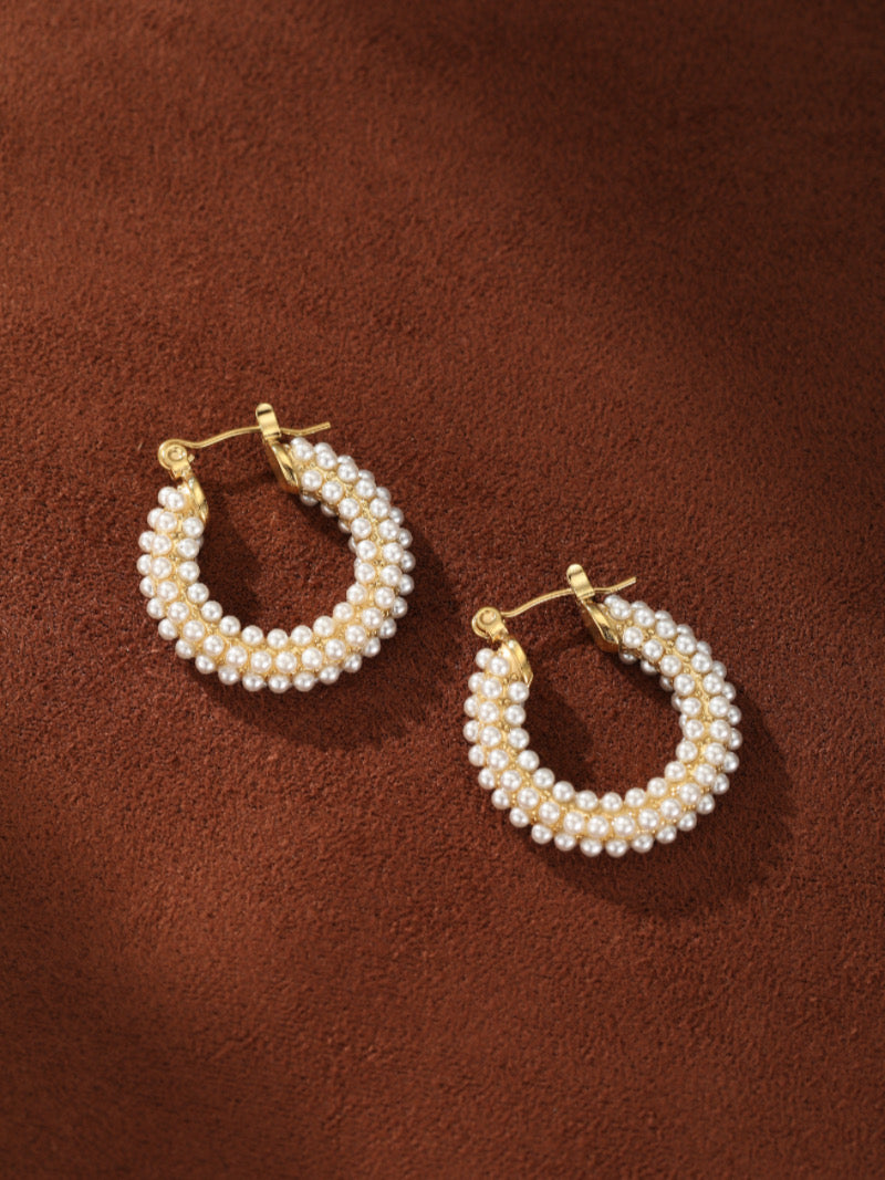 Luminous Bloom imitation pearl chunky hoop earrings with gold-toned base, densely adorned with lustrous white round imitation pearls.